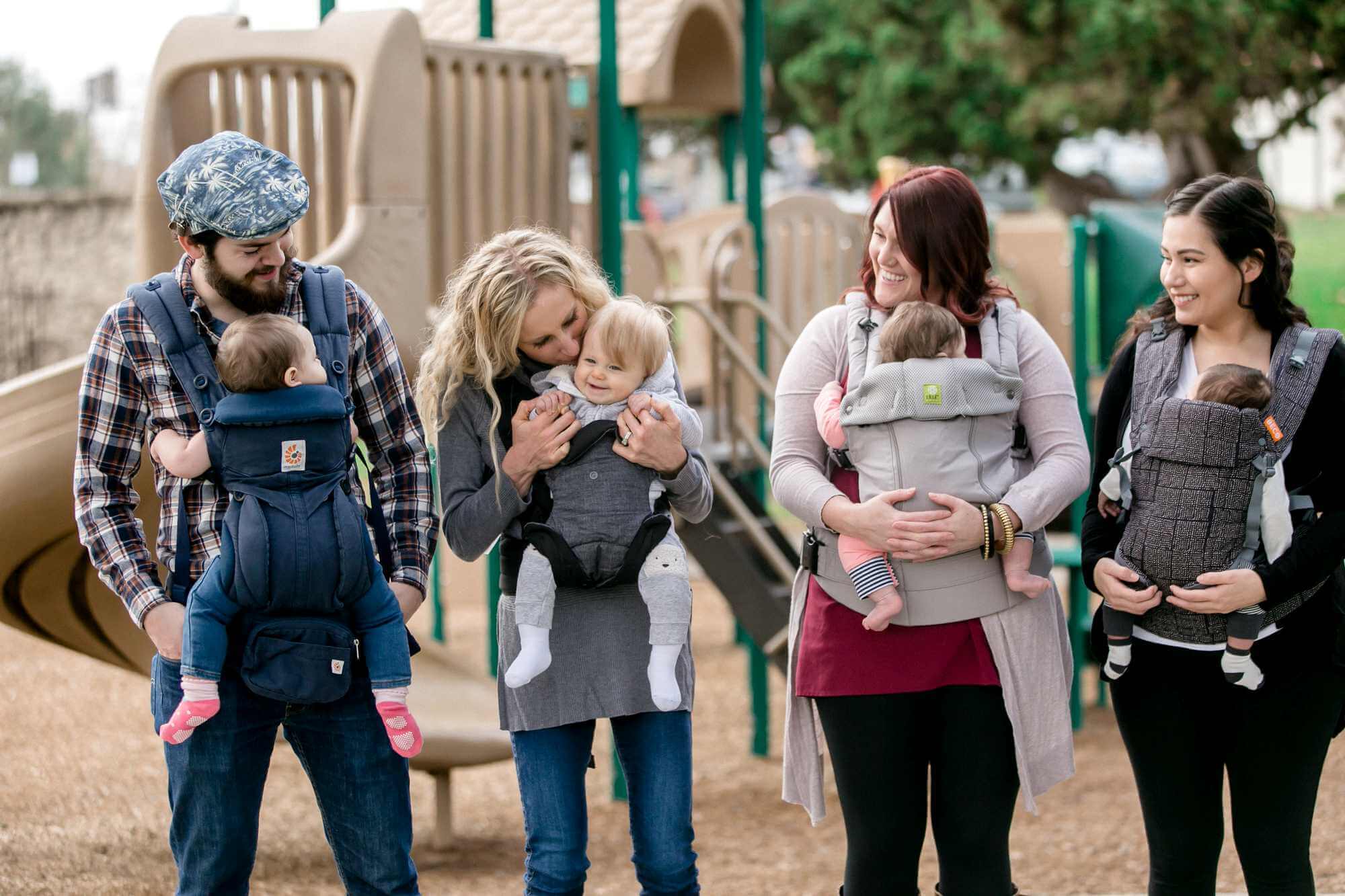 Parents with baby carriers